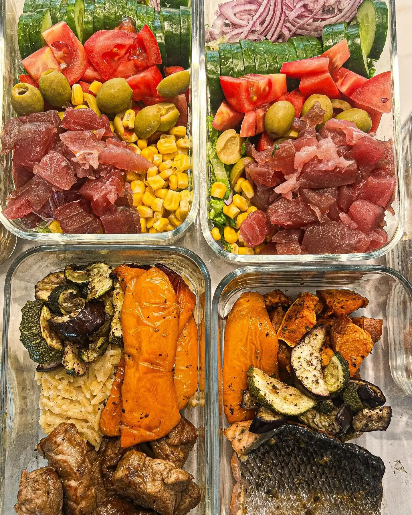 Fresh tuna, vegetables and corn arranged for meal preparation
