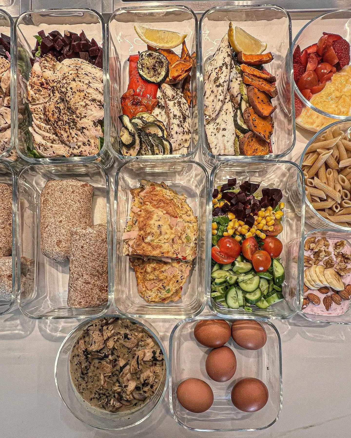 Weekly meal selection with fish, grains, salads and vegetables