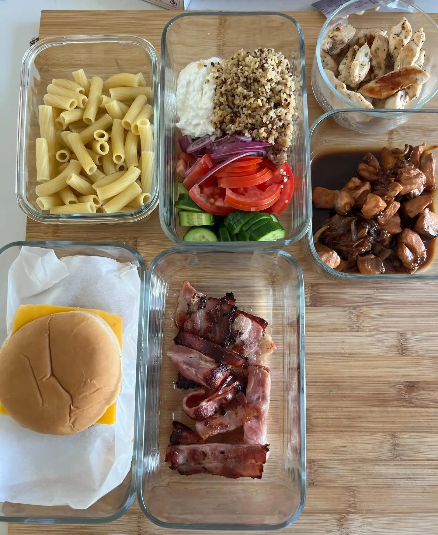 Chicken, pasta and fresh salad meal preparation