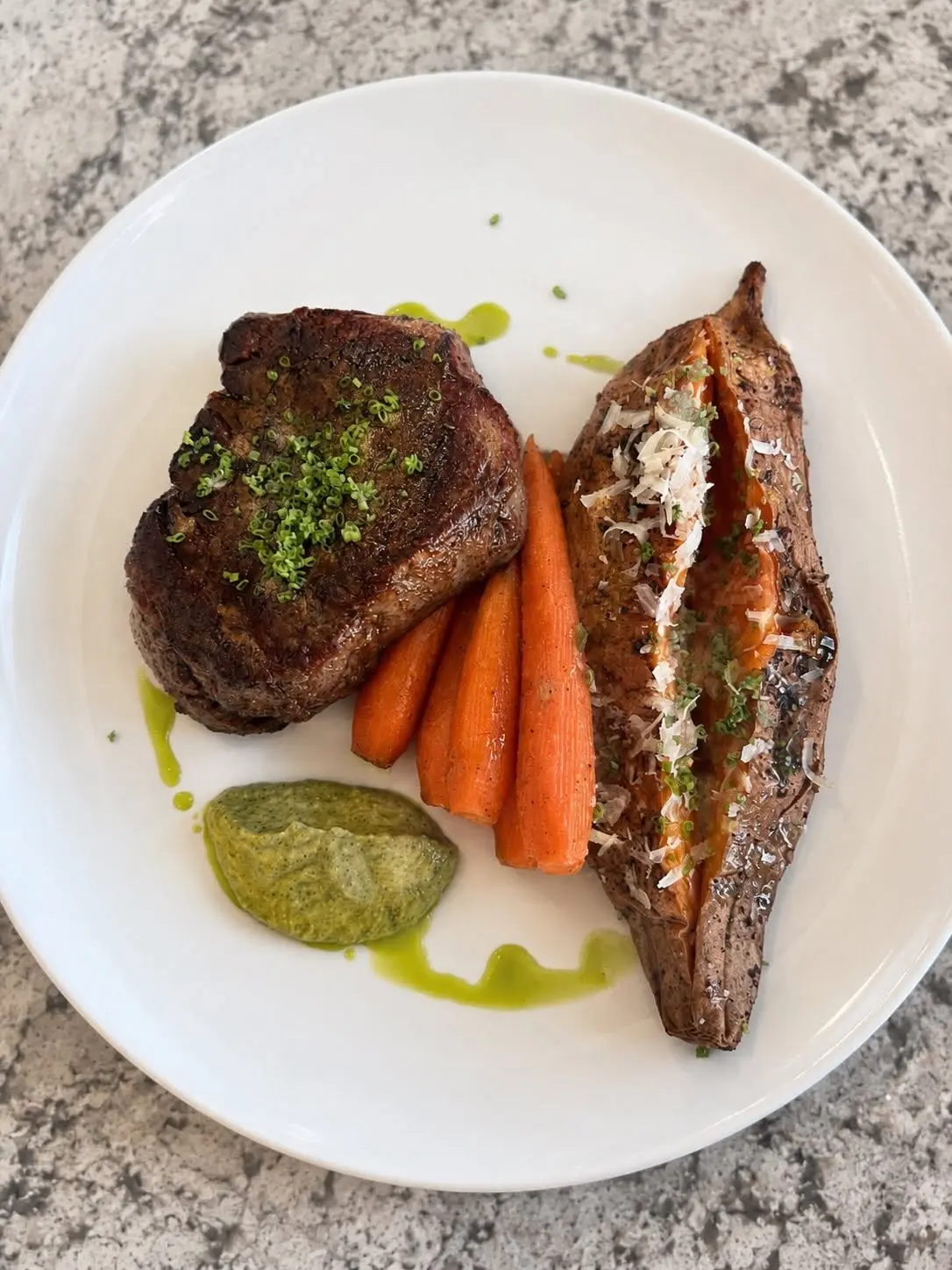 Seared steak with roasted sweet potato and carrots